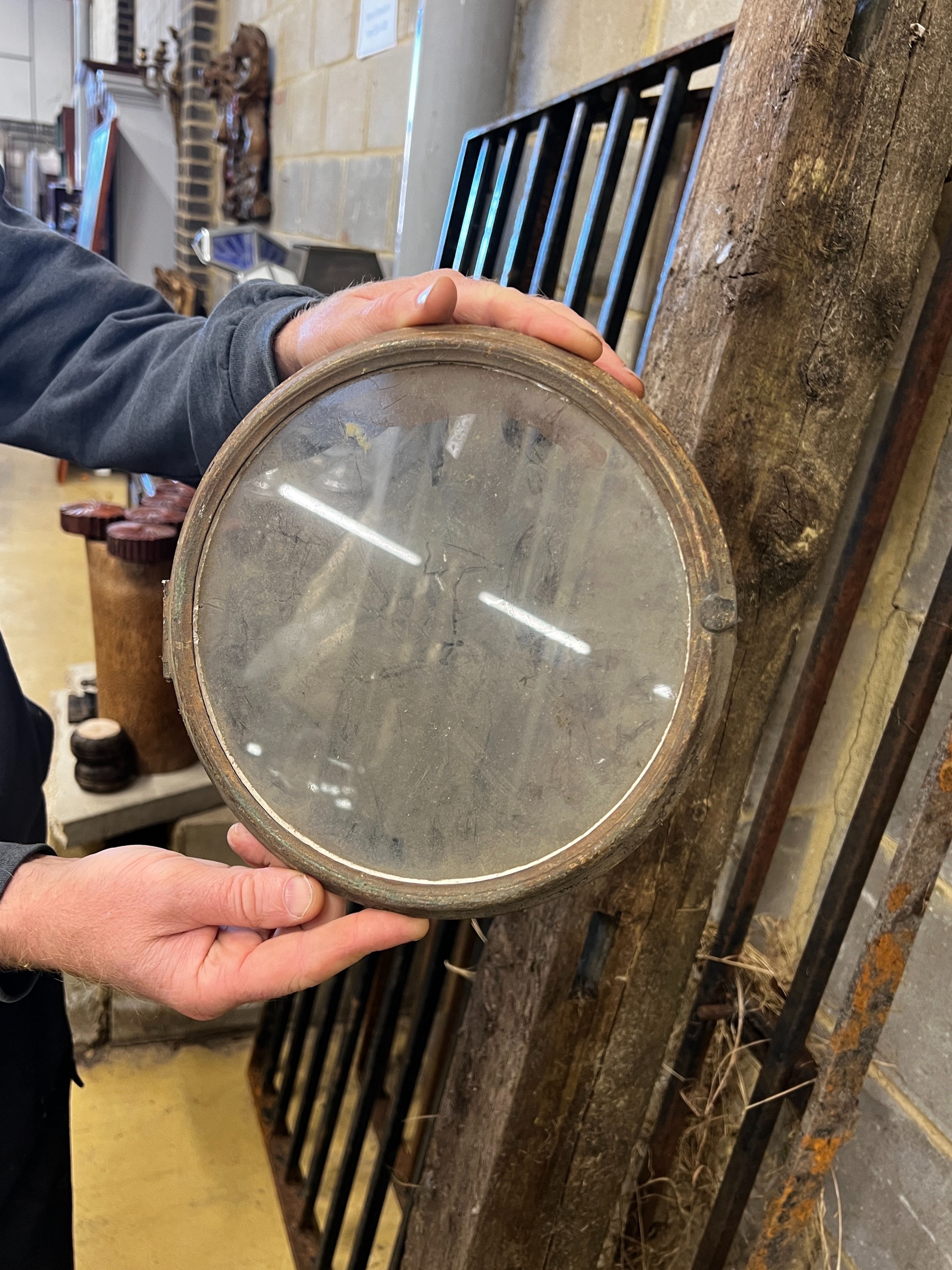 An early 19th century carved giltwood single fusee wall timepiece, silvered dial marked Thomas Wagstaffe, London. Case in need of restoration, height 78cm